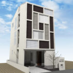 木目とパッチワーク風にタイル張りされた家の外観